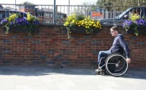 wheelchair pushing technique forwards